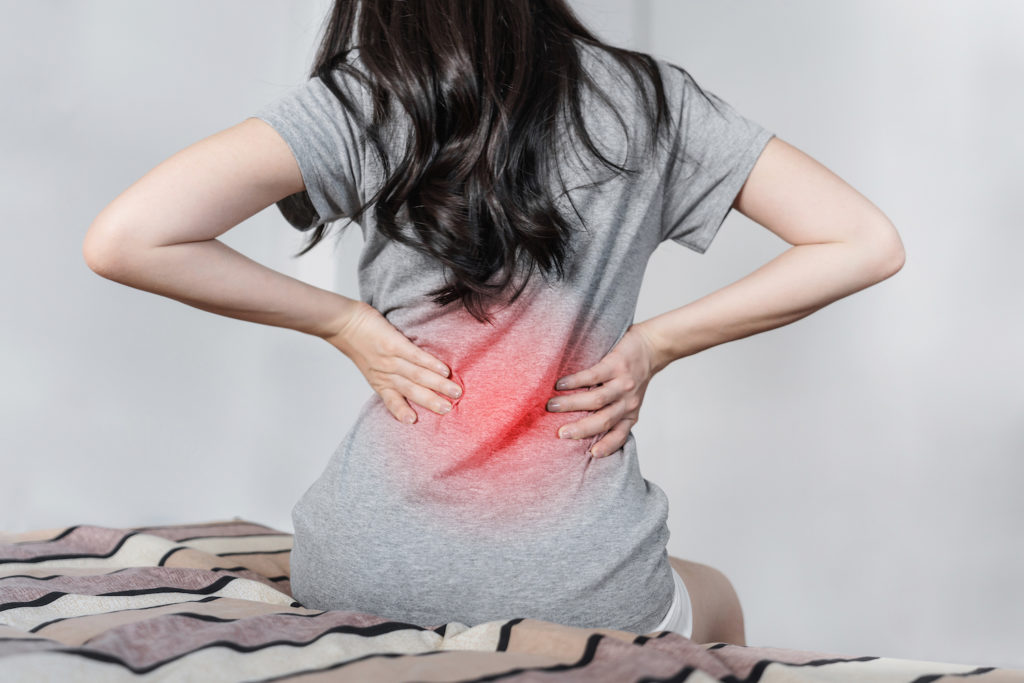 young woman experienced lower back pain